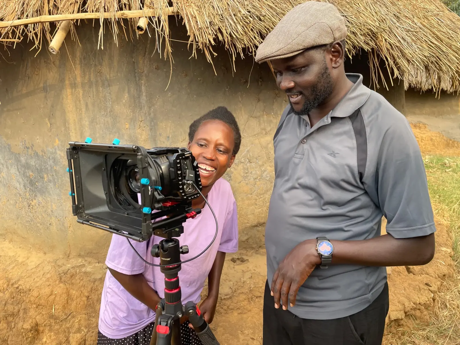 NUFA crew reviewing a shot on set